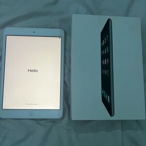 Mini iPad 2nd gen (silver) 16GB, like new never really used.